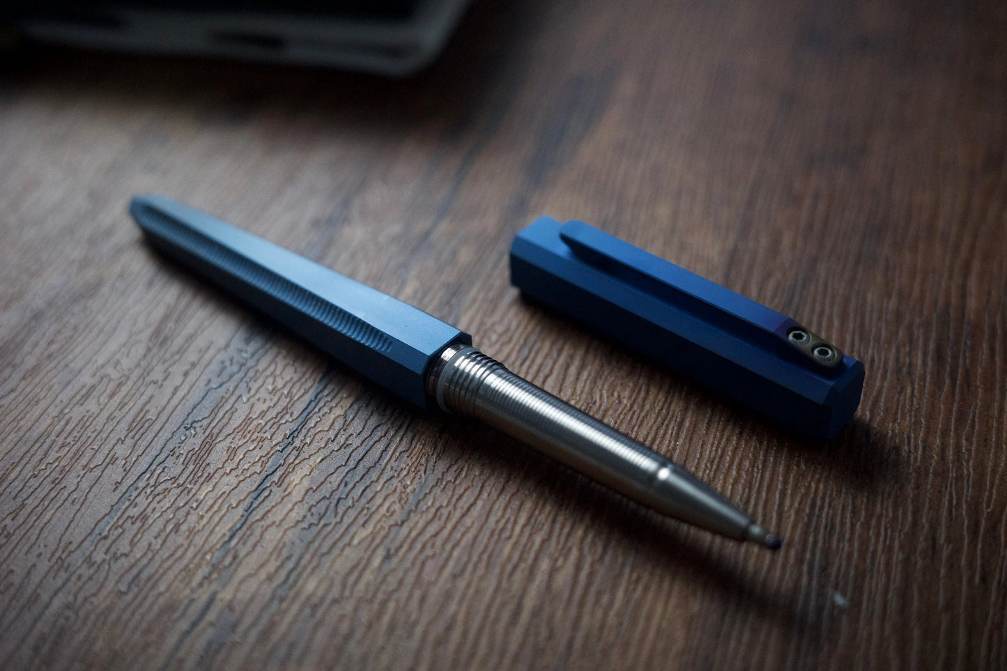 Anodized titanium tactical pen-fading blue