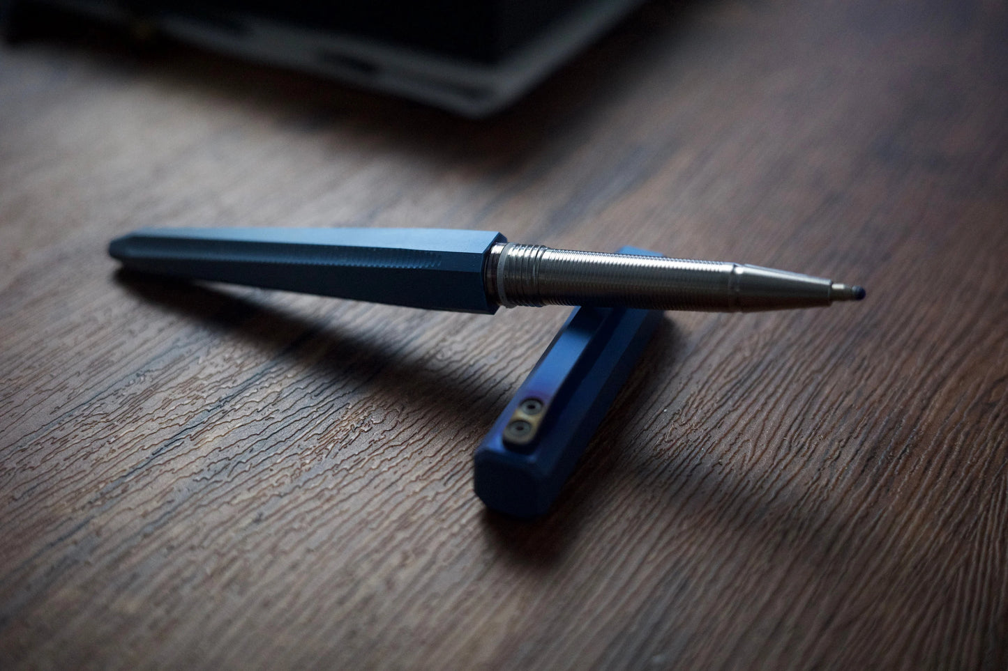 Anodized titanium tactical pen-fading blue