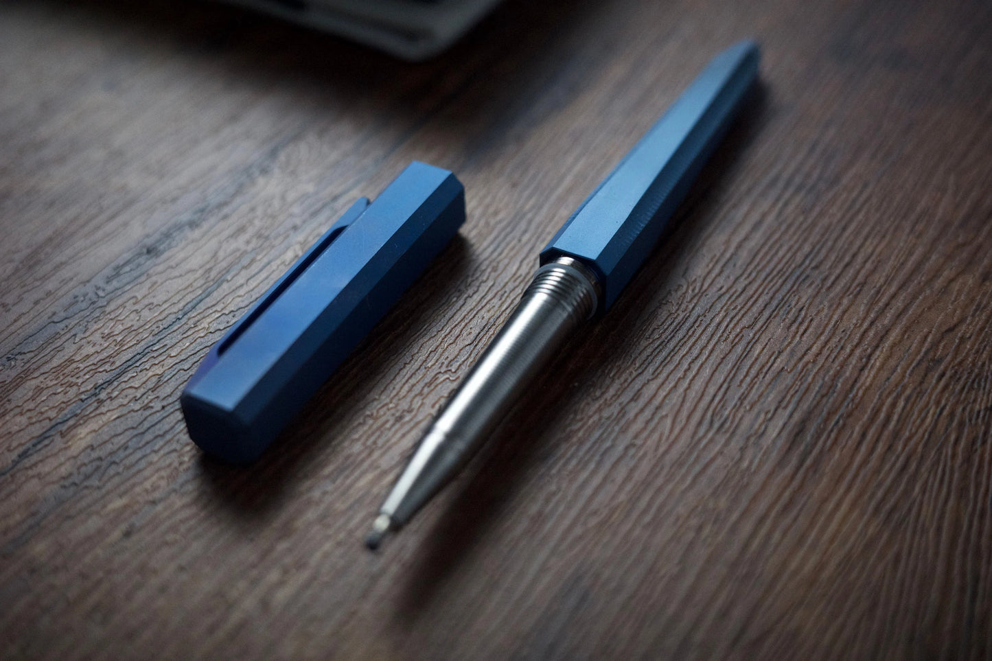 Anodized titanium tactical pen-fading blue