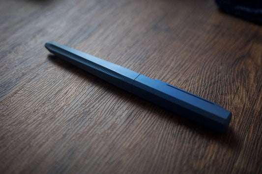 Anodized titanium tactical pen-fading blue